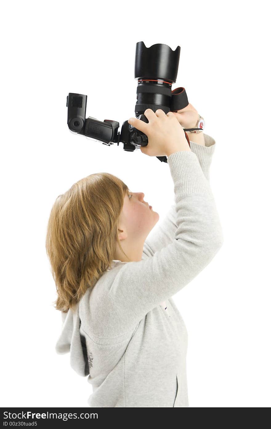 The young beautiful girl with the camera isolated on a white background