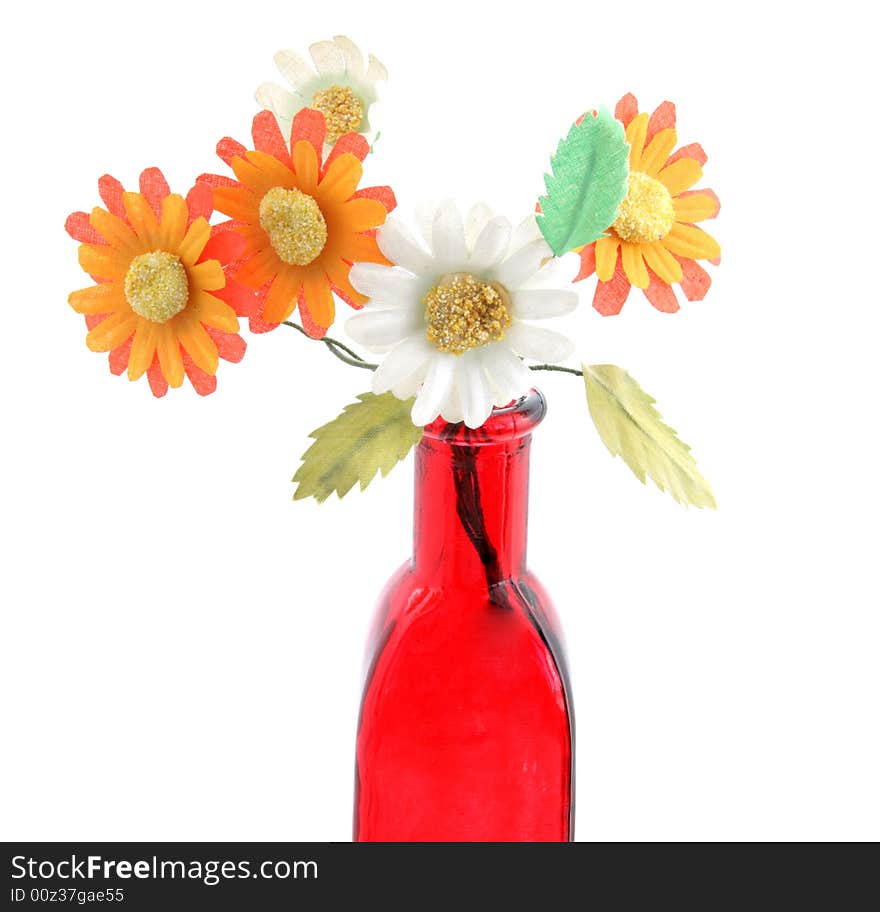 Red  decorated bottle with flowers on white. Red  decorated bottle with flowers on white