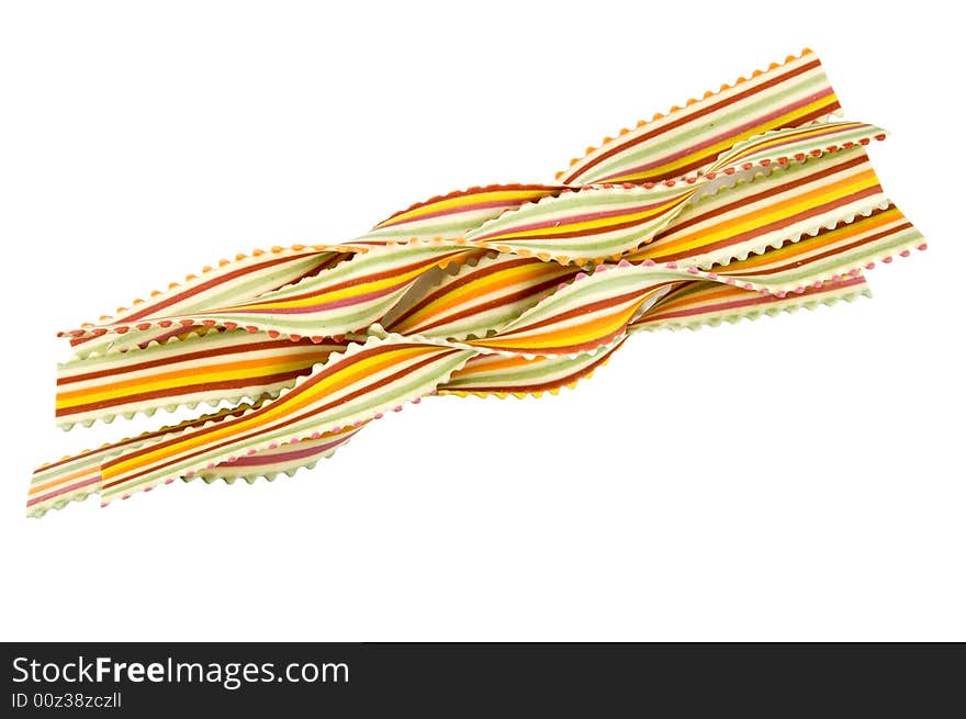 Colorful striped Italian pasta on white background