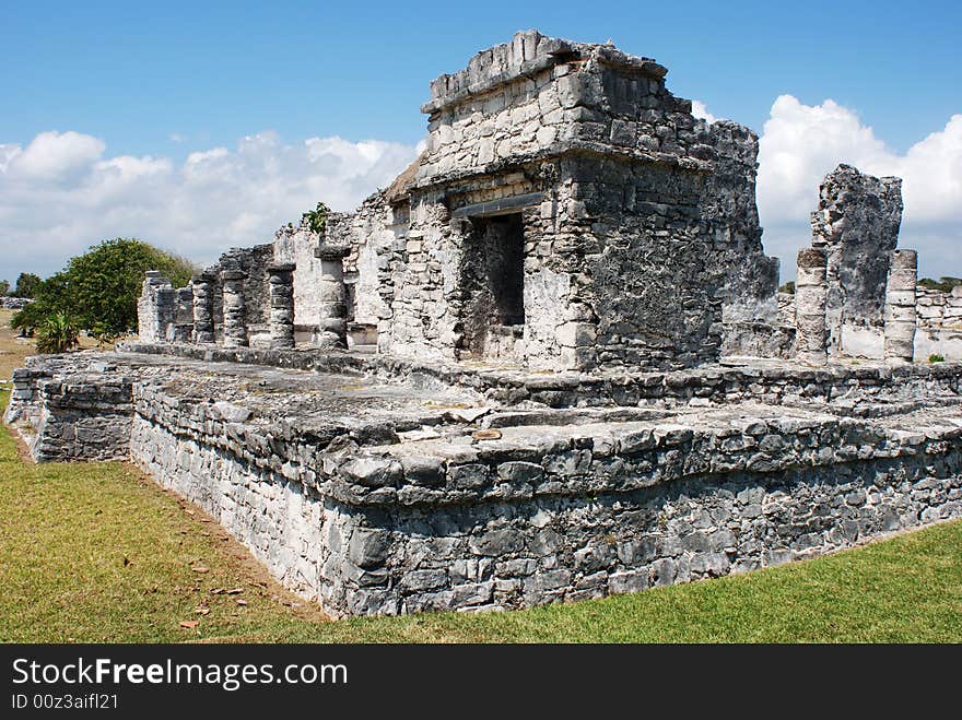 The view of Tulum ruins, Mayan archaeological site in Mexico. The view of Tulum ruins, Mayan archaeological site in Mexico.