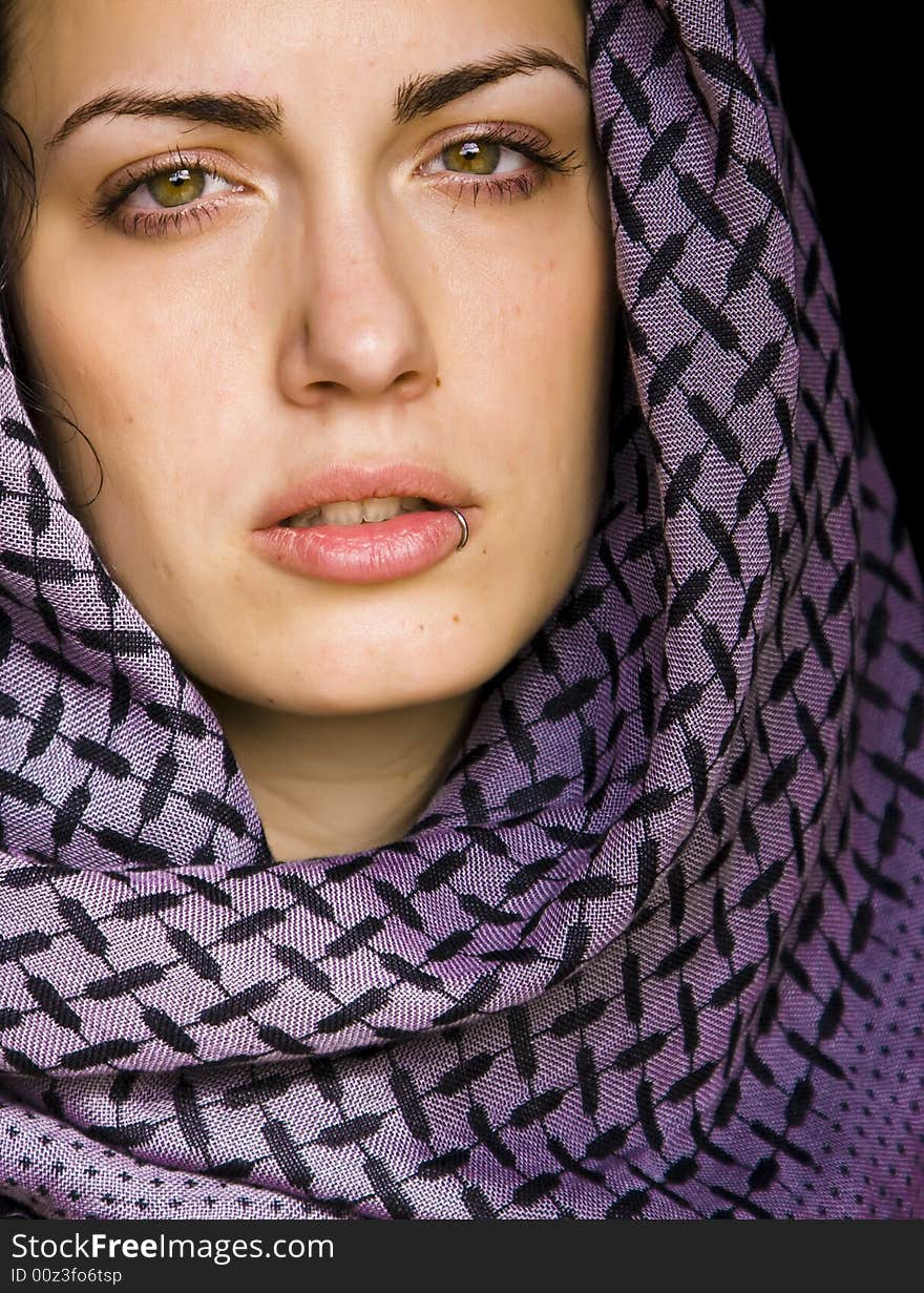 Arab woman using veil with her mouth pierced. Arab woman using veil with her mouth pierced.