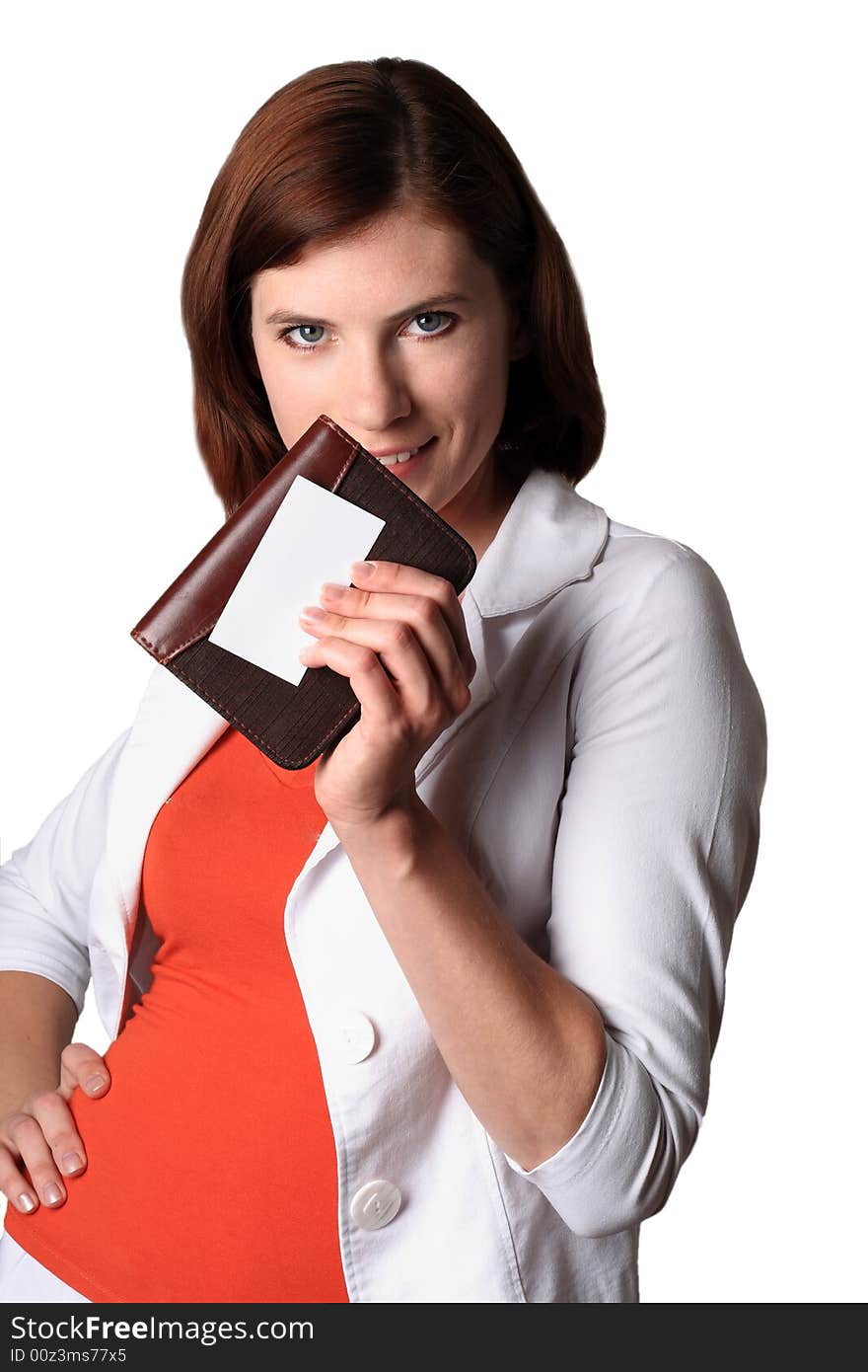 Business the woman in white clothes costing holds an organizer and the card in a hand. Business the woman in white clothes costing holds an organizer and the card in a hand