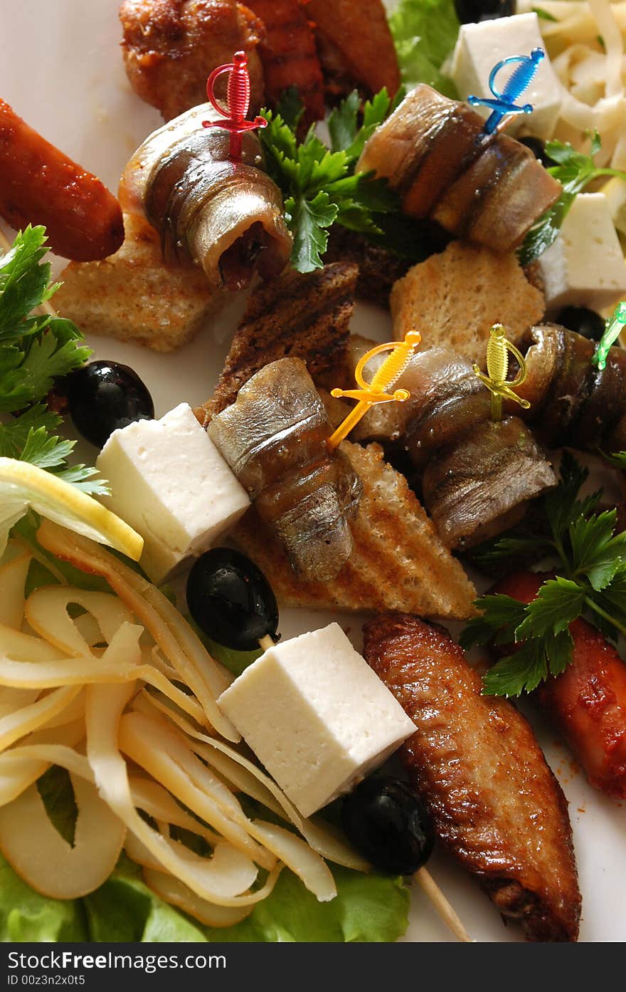 Salad from a salty herring with vegetables