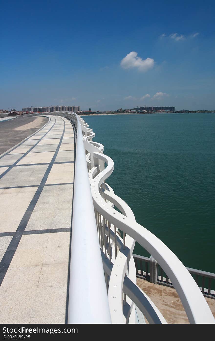 White railing of a new arcing bridge. White railing of a new arcing bridge