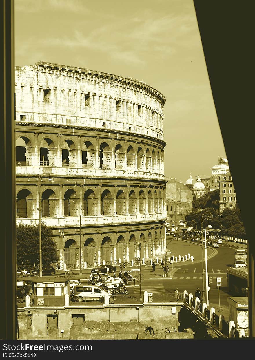 A monochrome image with the Coliseum viewed trough a window. A monochrome image with the Coliseum viewed trough a window