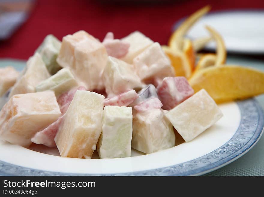 Appetizing salad on a plate. Close up