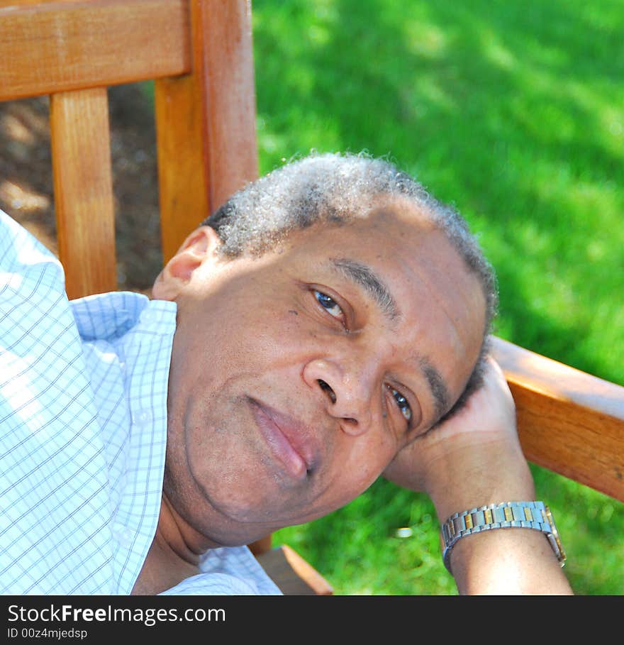 Portrait of a african american male outside.