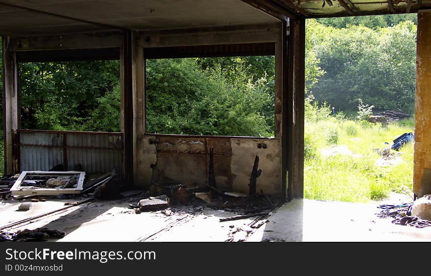 Ruined home with sight in a garden. Ruined home with sight in a garden