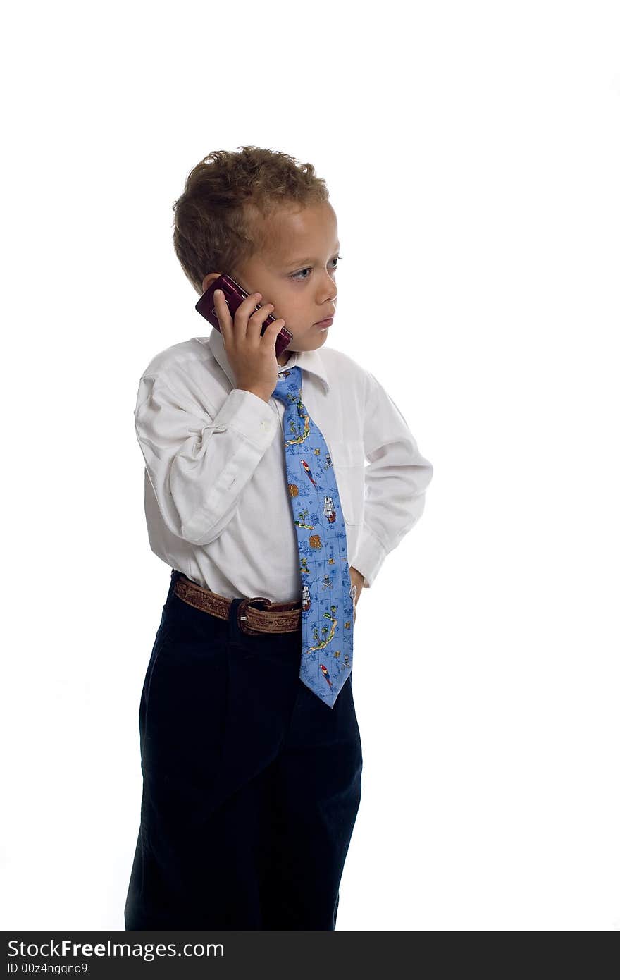 Young Boy Dressed As Businessman Uses Cell Phone