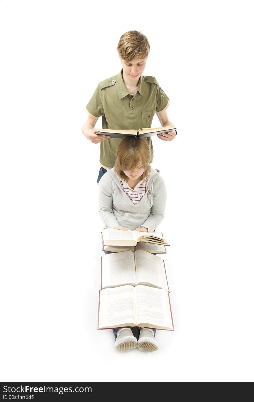 The two young students isolated on a white