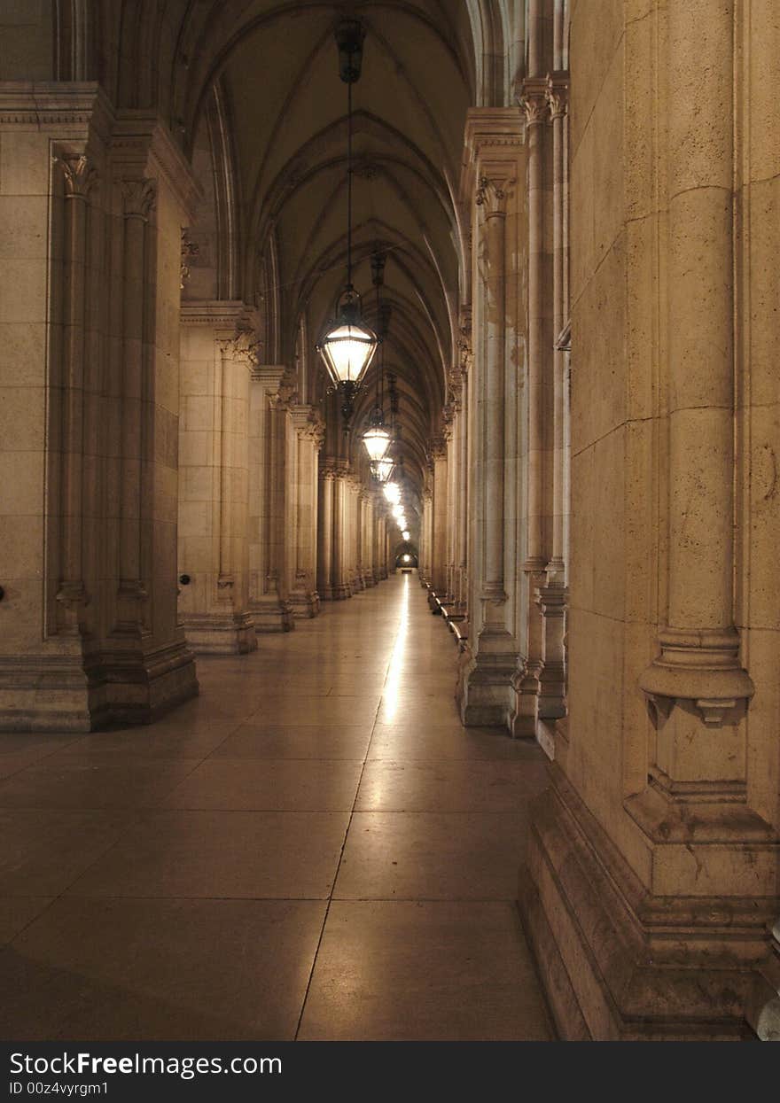 A long corridor in a ancient building. A long corridor in a ancient building