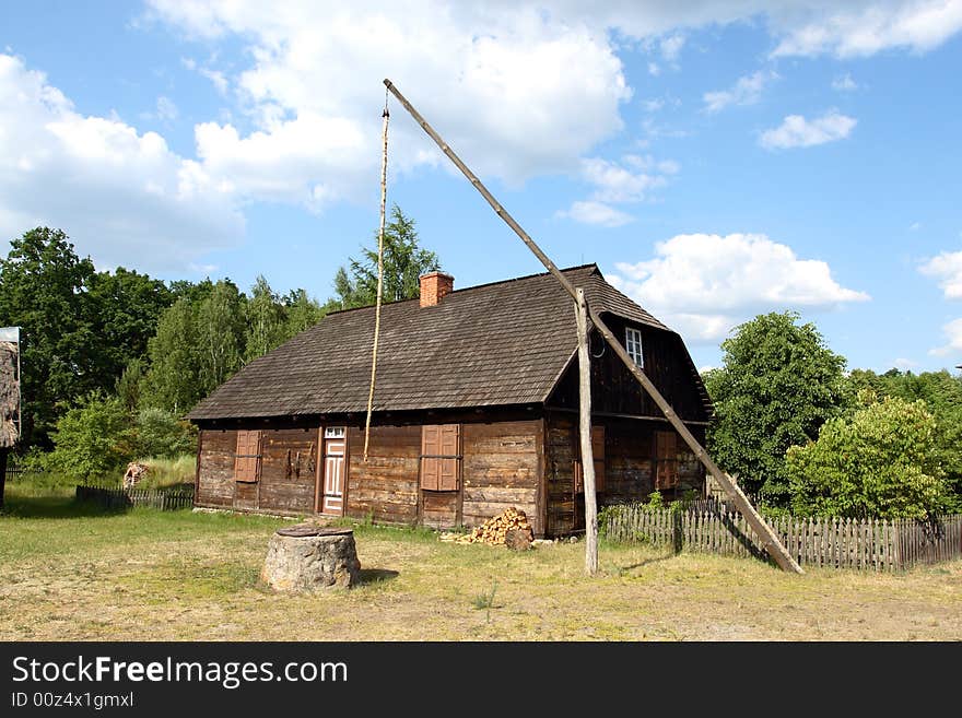 Old house with blue sky in background