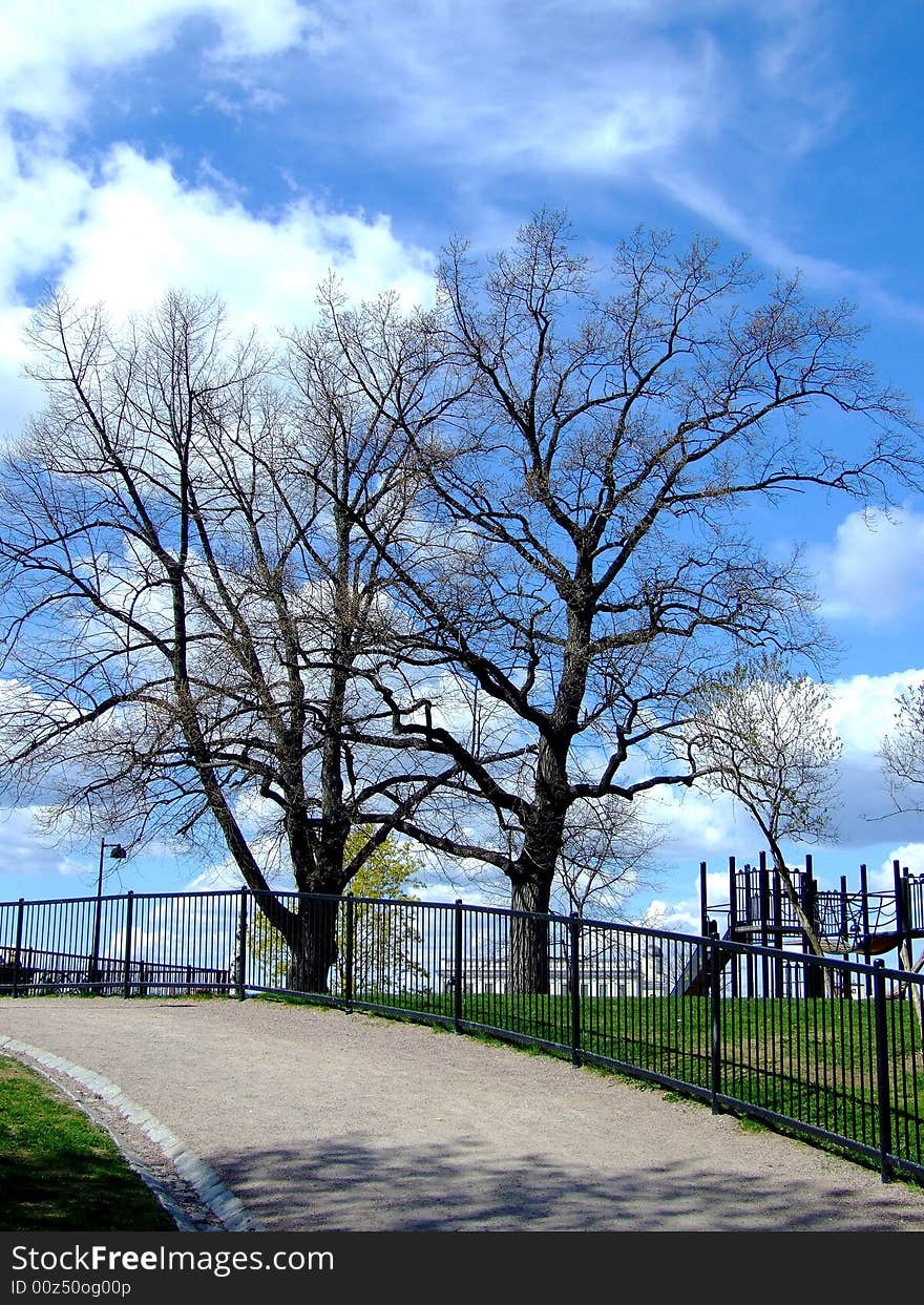 A walk in the park, a beautiful sky, children's playground. A walk in the park, a beautiful sky, children's playground