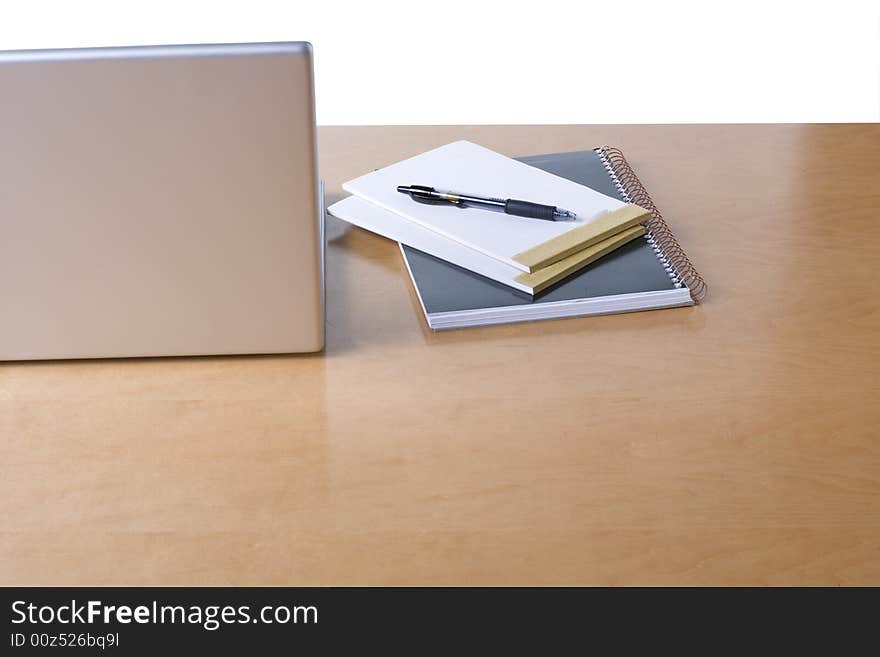 A workstation with computer and office products