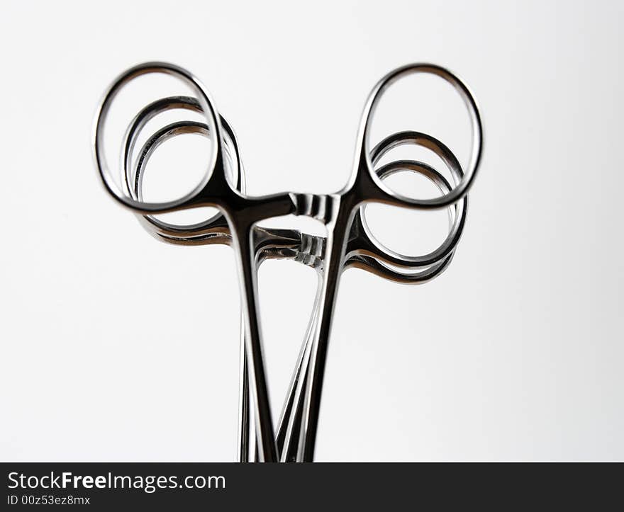 Stock pictures of hemostats used in surgery and in the clinical practice