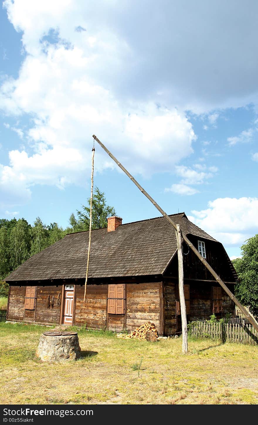 Old house with blue sky in background