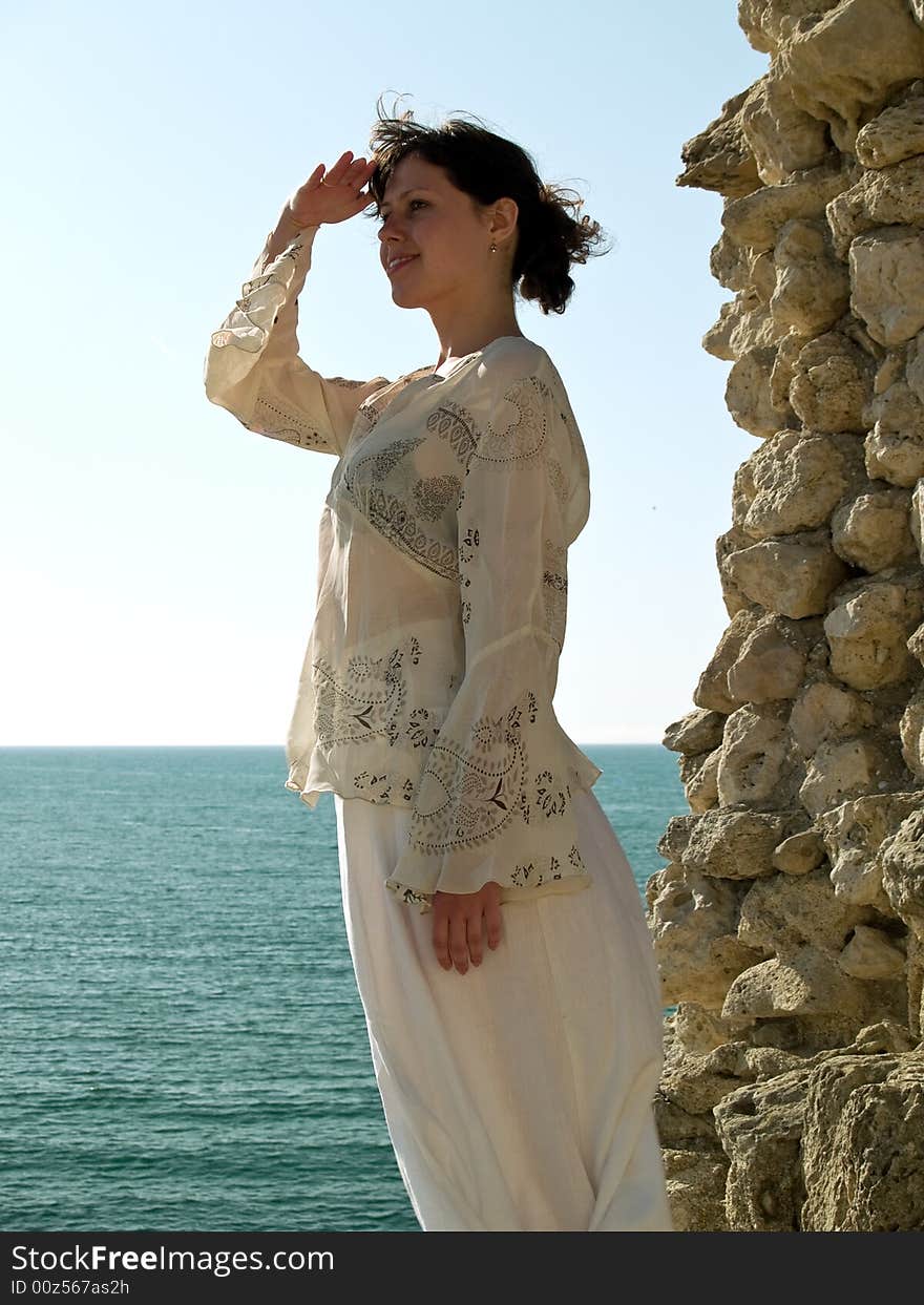 Beautiful Girl Looks at Sea