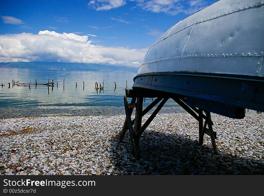 Up side down small boat on the beach. Up side down small boat on the beach