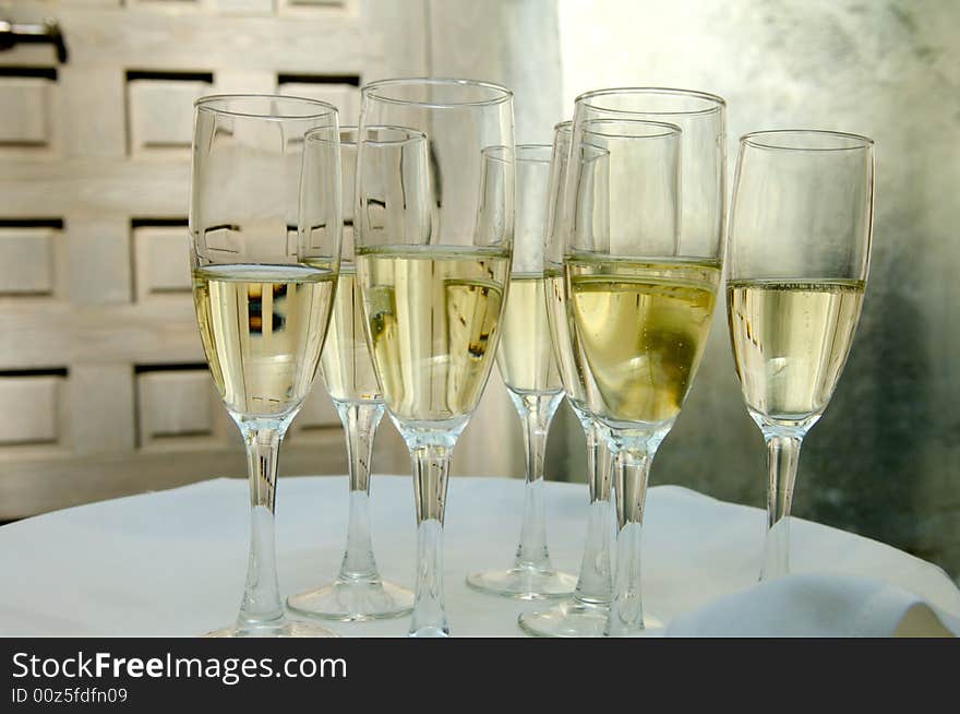 An image of glasses full of champagne. An image of glasses full of champagne