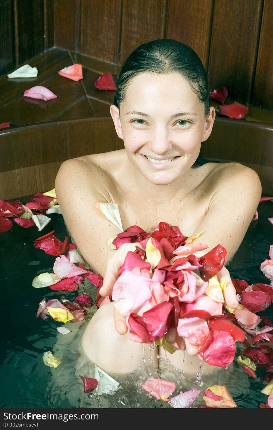 Woman At Spa Soaking In Large Bathtub - Close-up