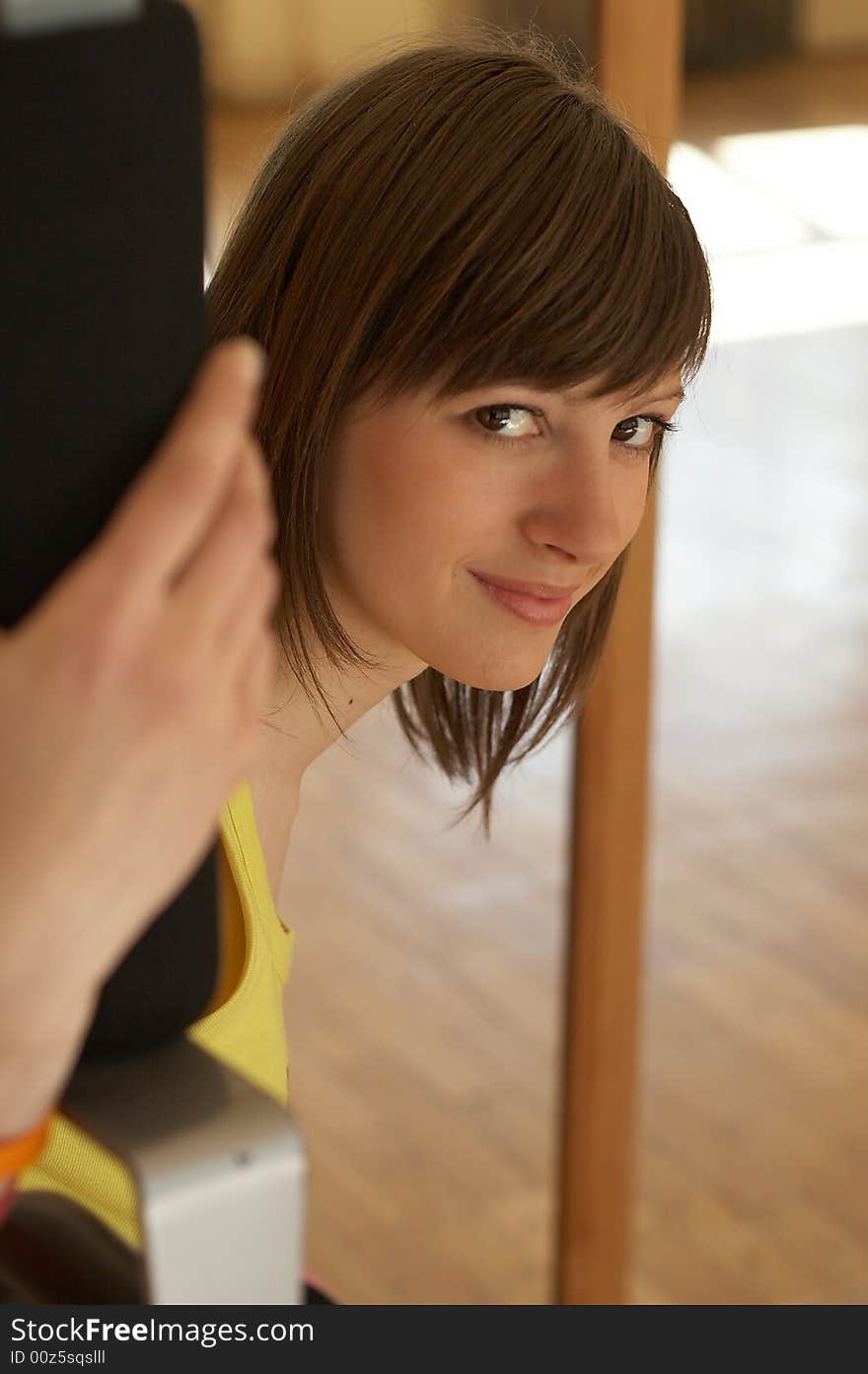 A young woman in a health club. A young woman in a health club