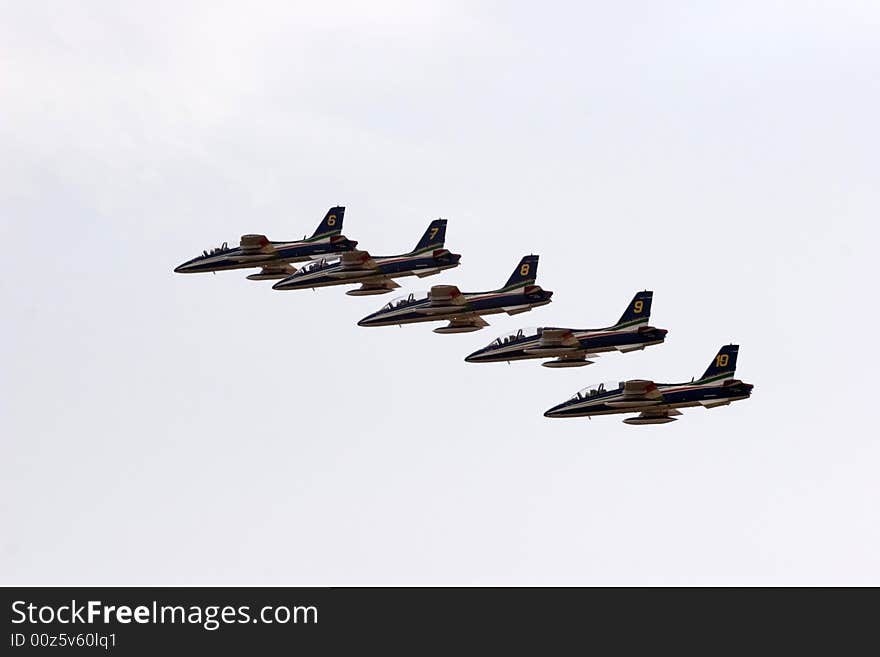 Italian arrows plans up in the sky during a show. Italian arrows plans up in the sky during a show