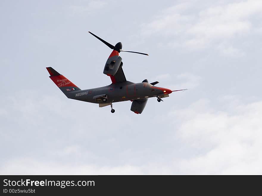 A presentation of the new elicopter/plane during an exhibition. A presentation of the new elicopter/plane during an exhibition