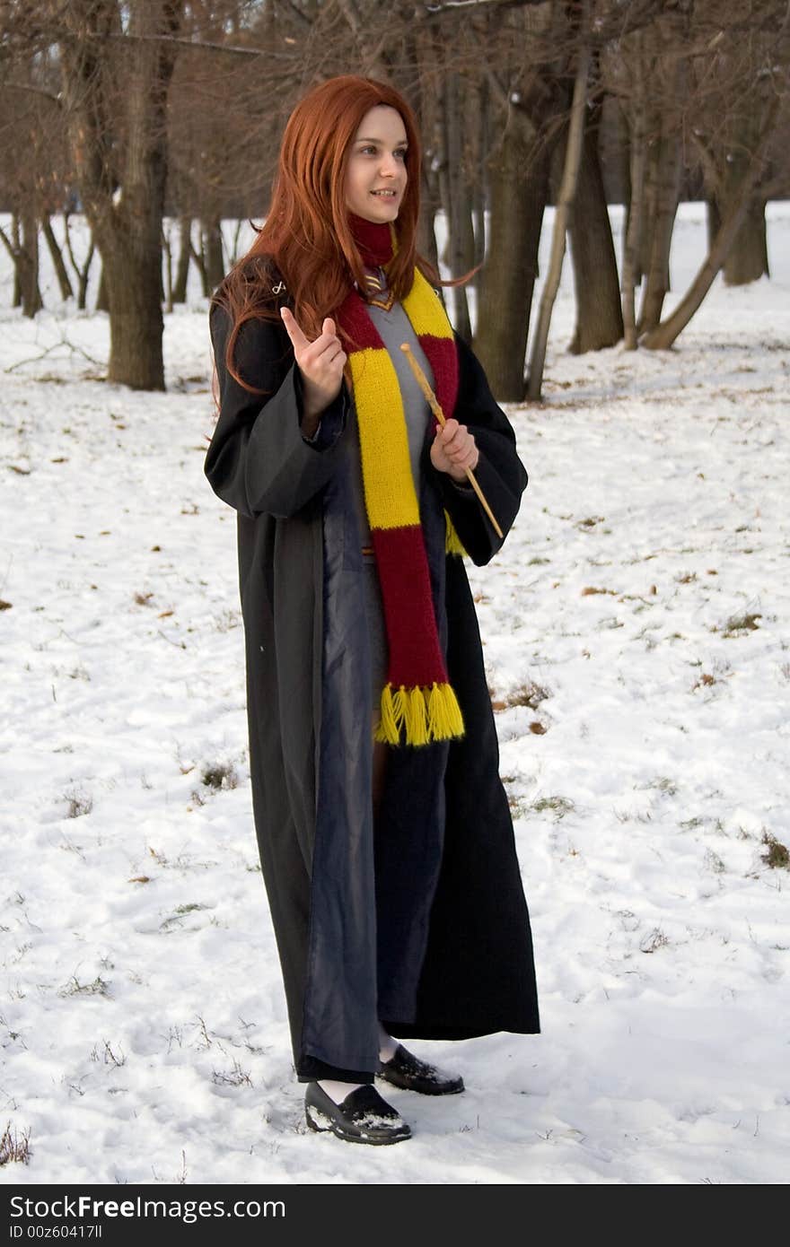 Winter morning: girl standing near college