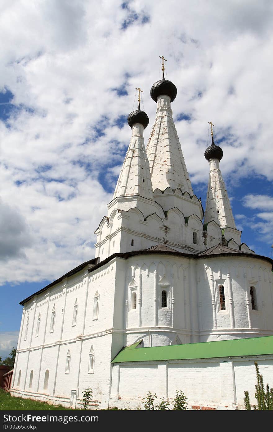 The white monastery on the sky background