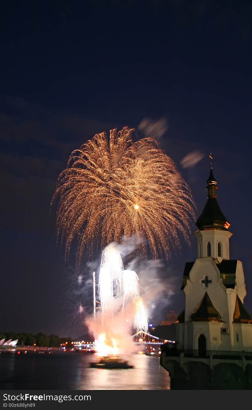 Firework and church on river