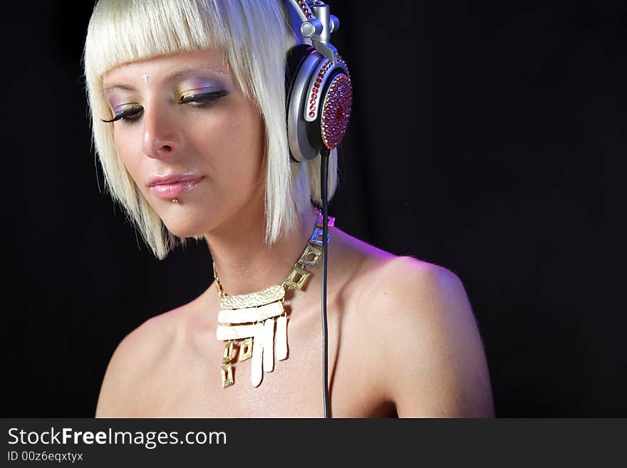 Close-up of a very beautiful female with studio light. Close-up of a very beautiful female with studio light