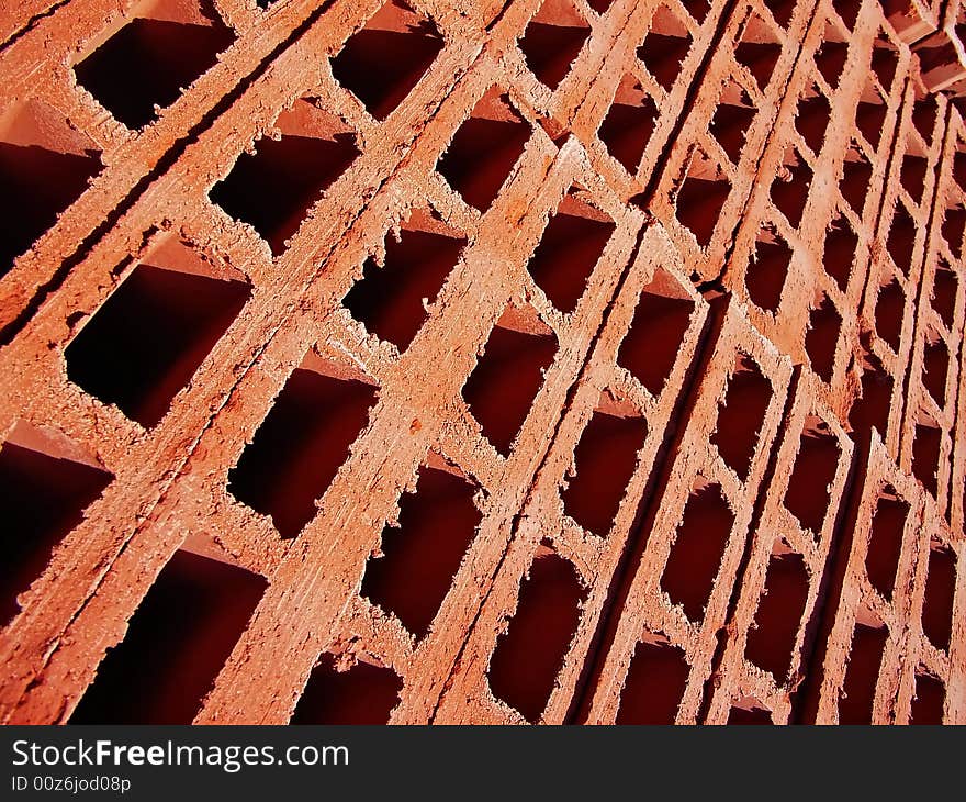 Detail of the holes of red bricks stacked. Detail of the holes of red bricks stacked