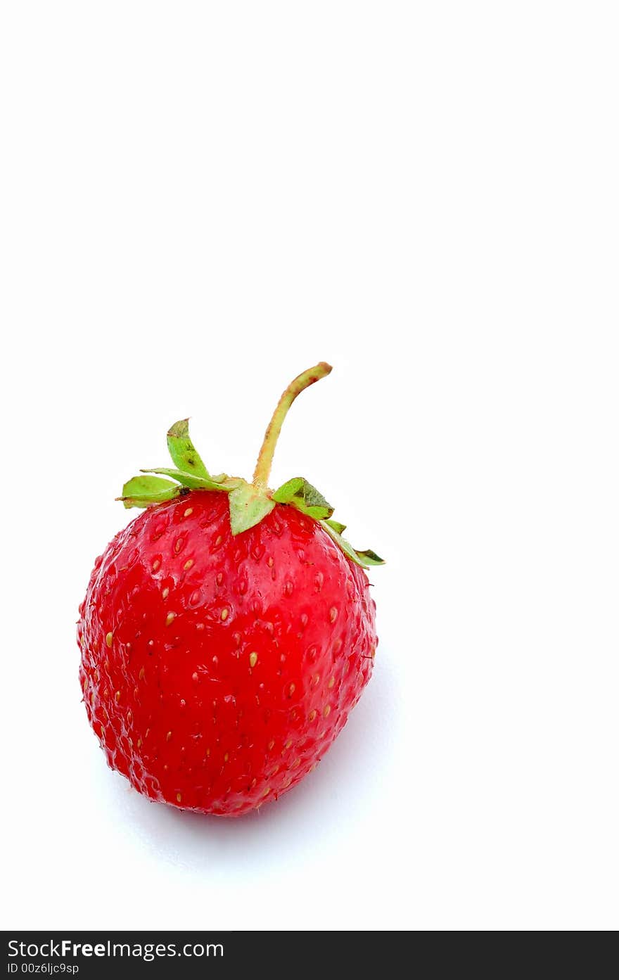 Delicious ripe strawberry on a white background.