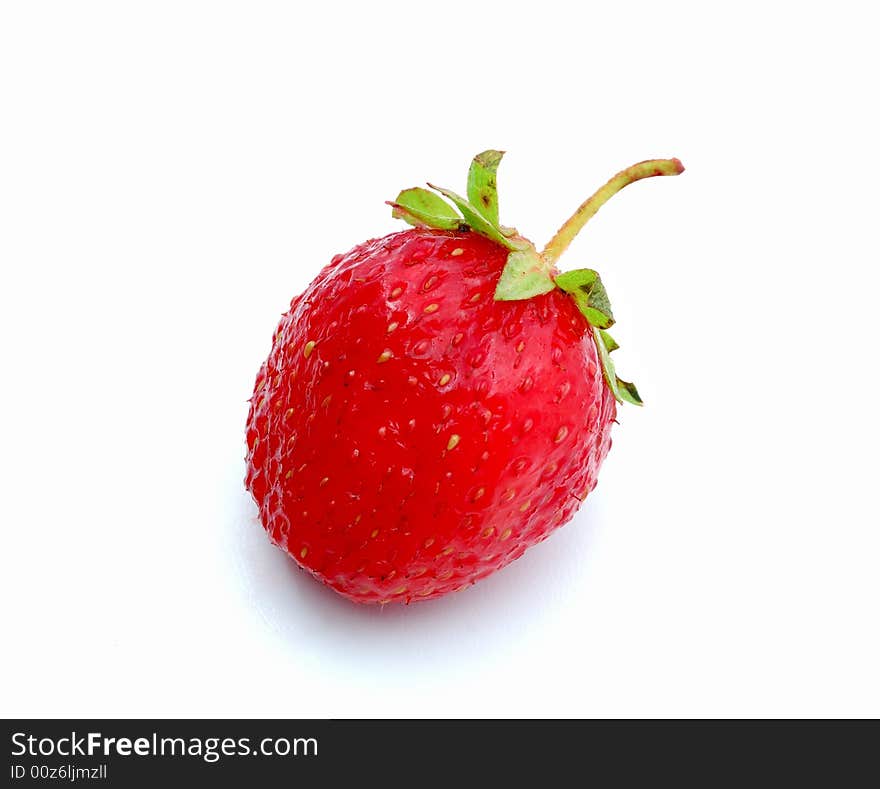 Delicious ripe strawberry on a white background.