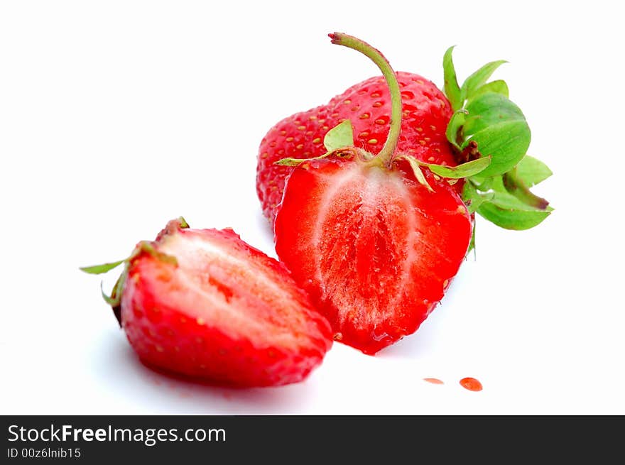 Delicious ripe strawberries on a white background.