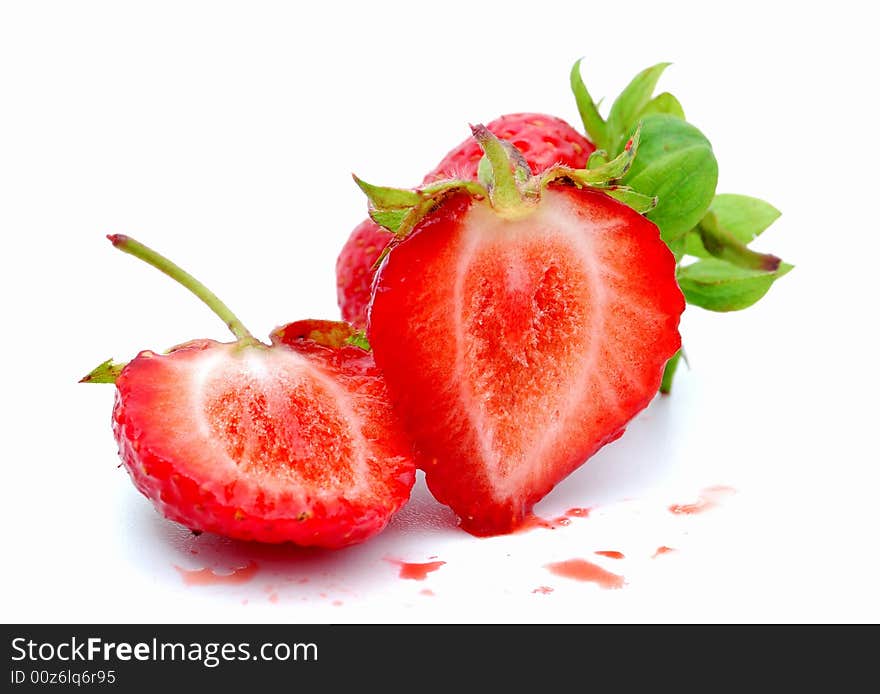 Delicious ripe strawberries on a white background.