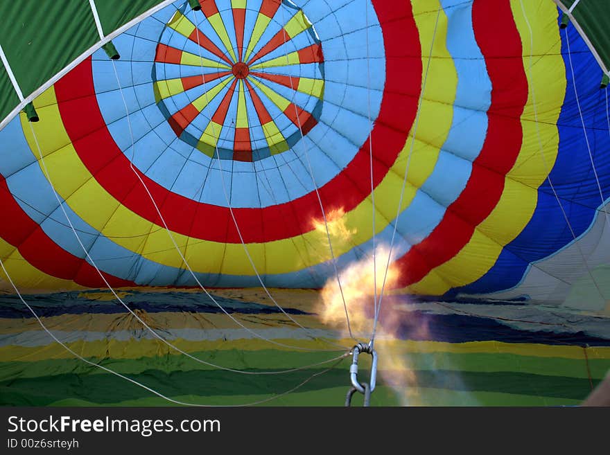 Hot aire is inflaming a balloon for flying