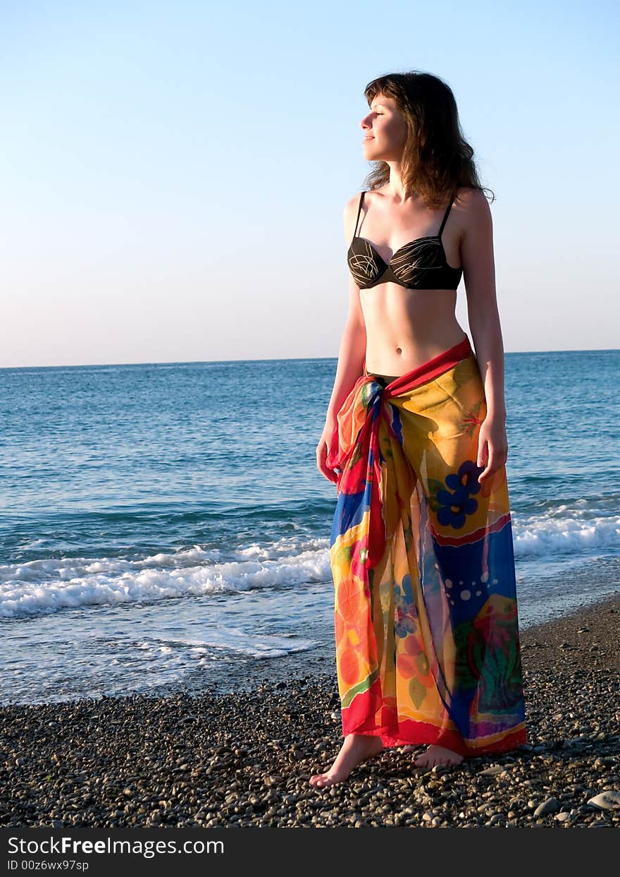 Beautiful lady in Bikini on Beach Sunset