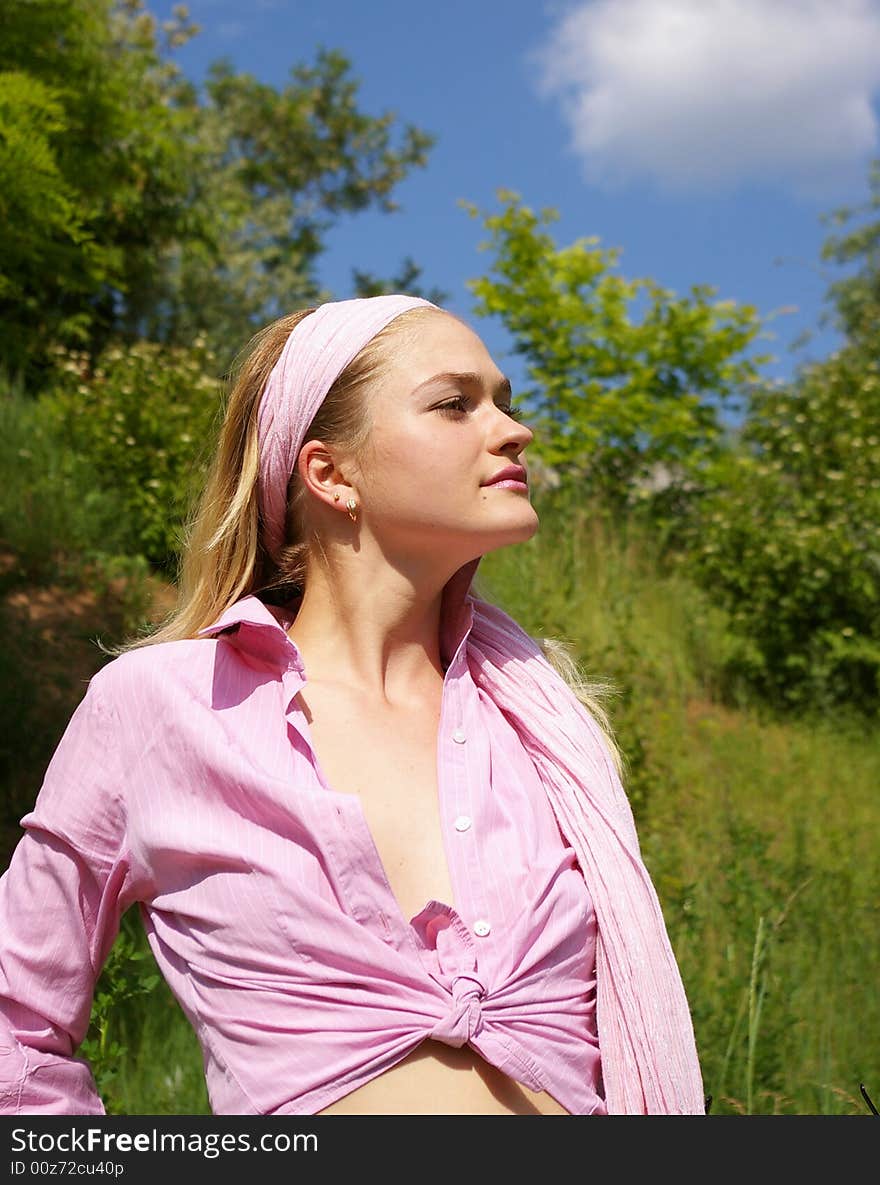 Beautiful woman in a pink