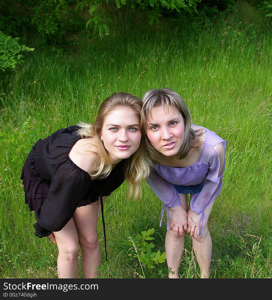 Young women at a wood, smiling, portrait. Young women at a wood, smiling, portrait