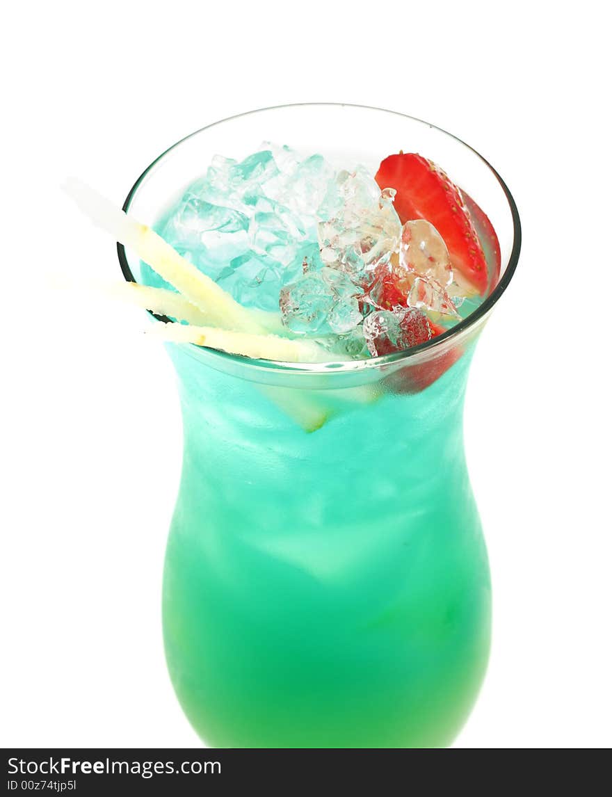 Tropical Acoholic Drink Made of Rum, Pineapple Juice, Blue Curacao, Sweet and Sour Mix. Slice of Apple and Strawberry as a Garnish. Tropical Acoholic Drink Made of Rum, Pineapple Juice, Blue Curacao, Sweet and Sour Mix. Slice of Apple and Strawberry as a Garnish.