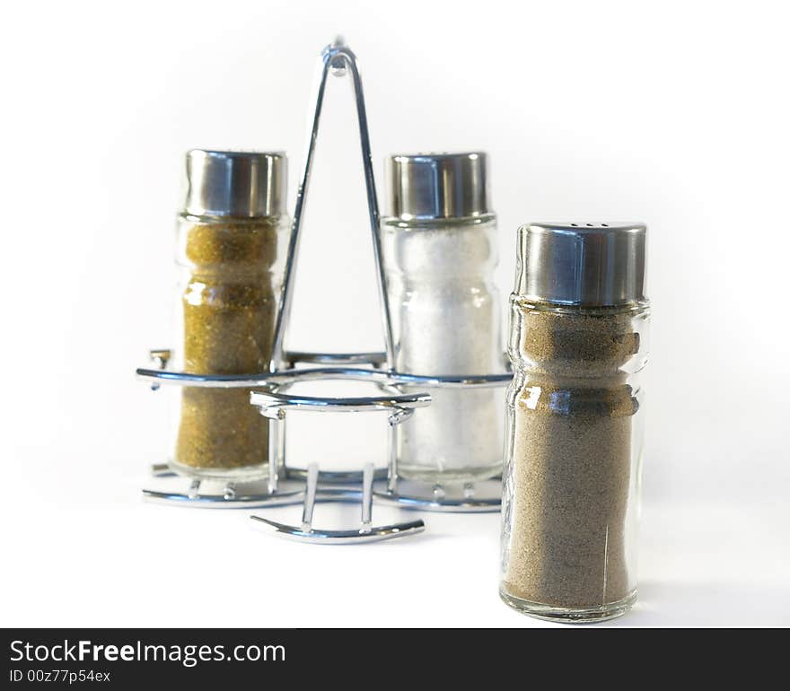 Salt and pepper on a white background