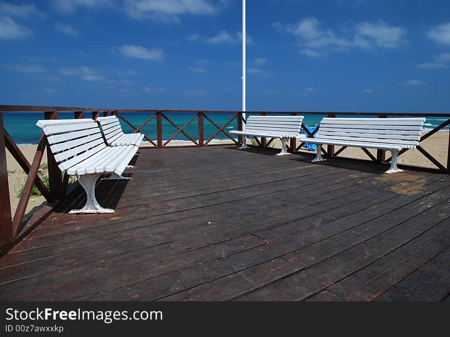 Bench on marine beach in city nagariya