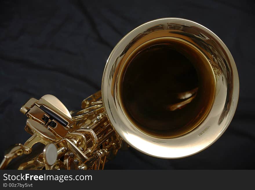 Saxophone detail on a black background. Saxophone detail on a black background