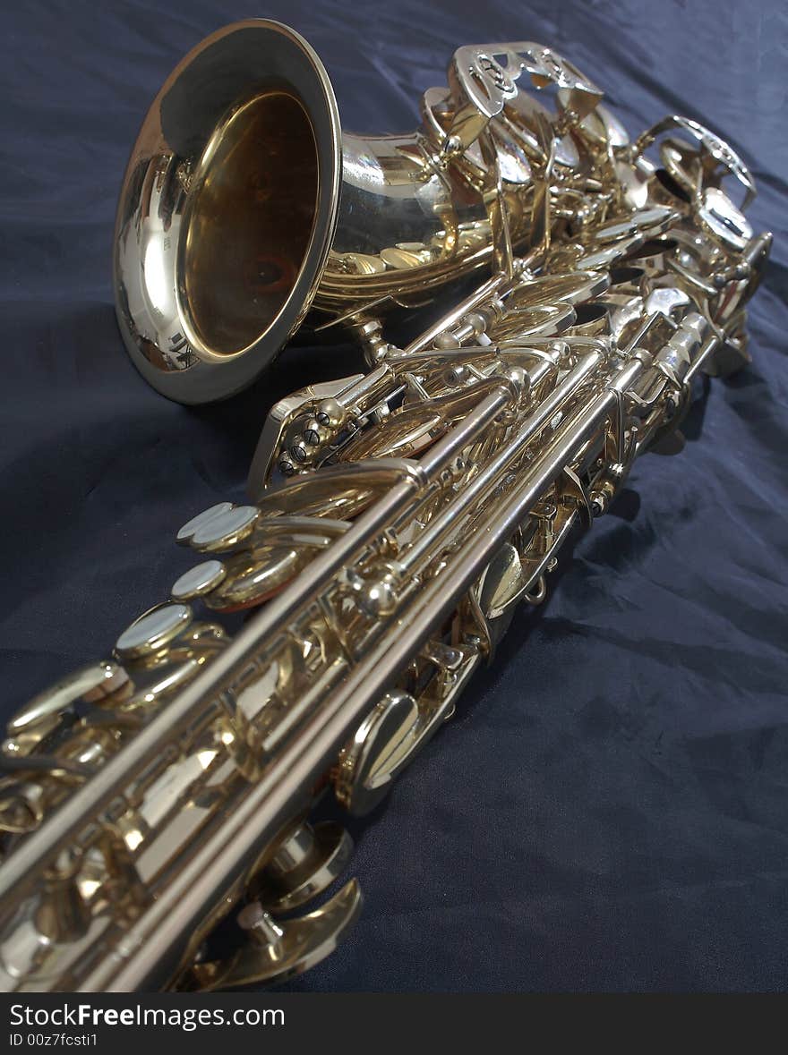 Saxophone detail on a black background. Saxophone detail on a black background