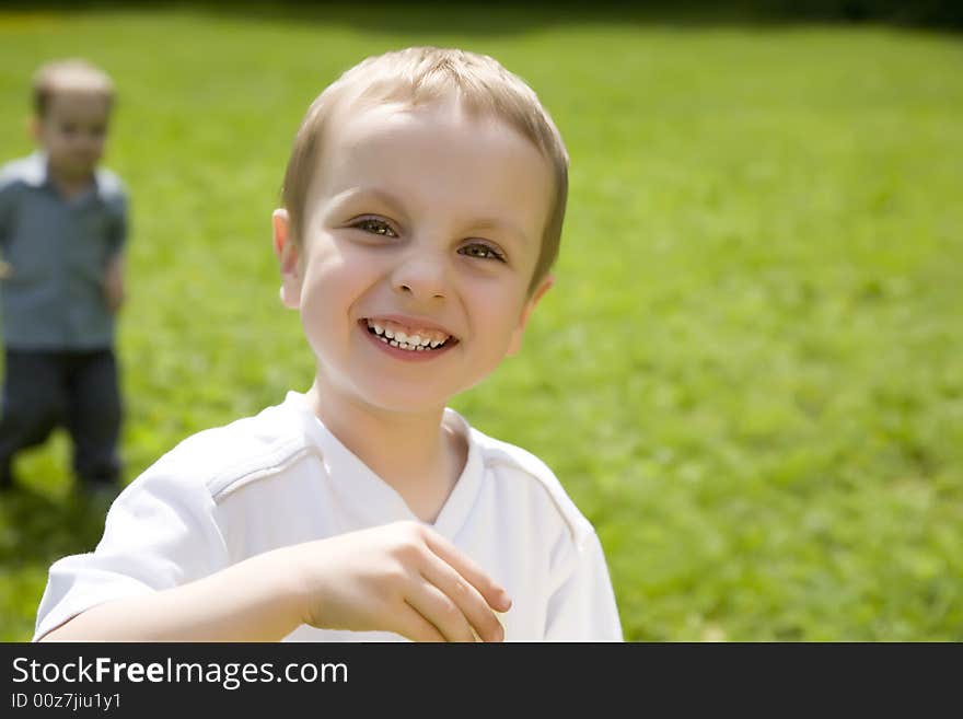 Laughing Boy On The Nature Background