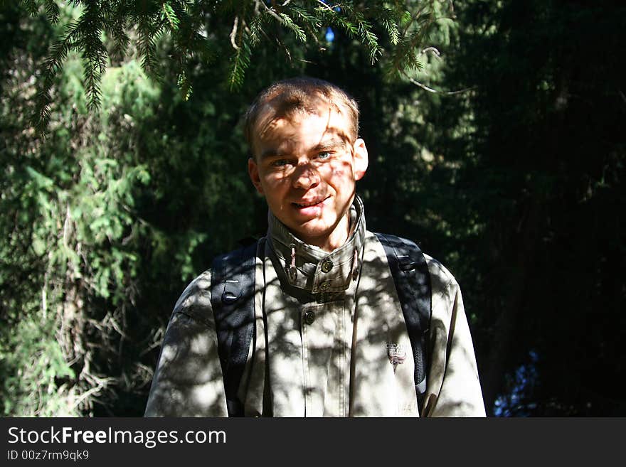 Portrait of young men tourist with patern of shadow on face. Portrait of young men tourist with patern of shadow on face