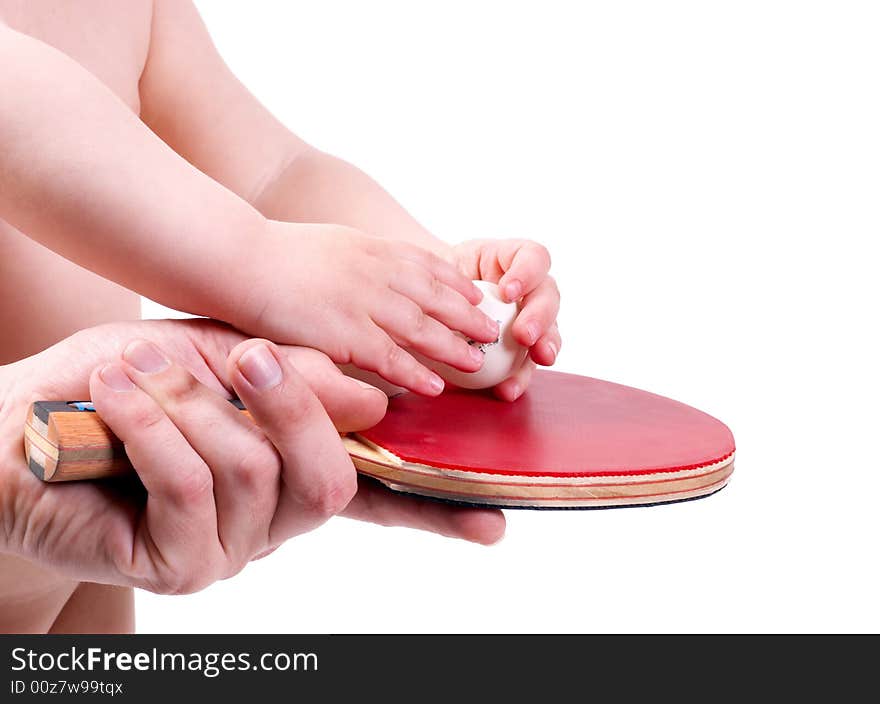 The child plays table tennis