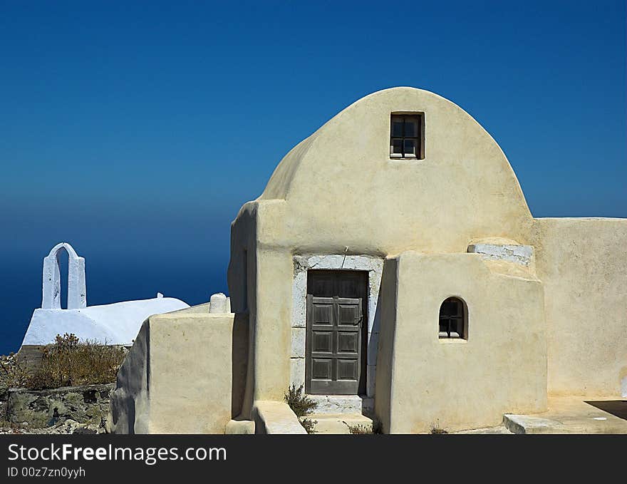 Greek buildind overlooking the Caldera. Greek buildind overlooking the Caldera