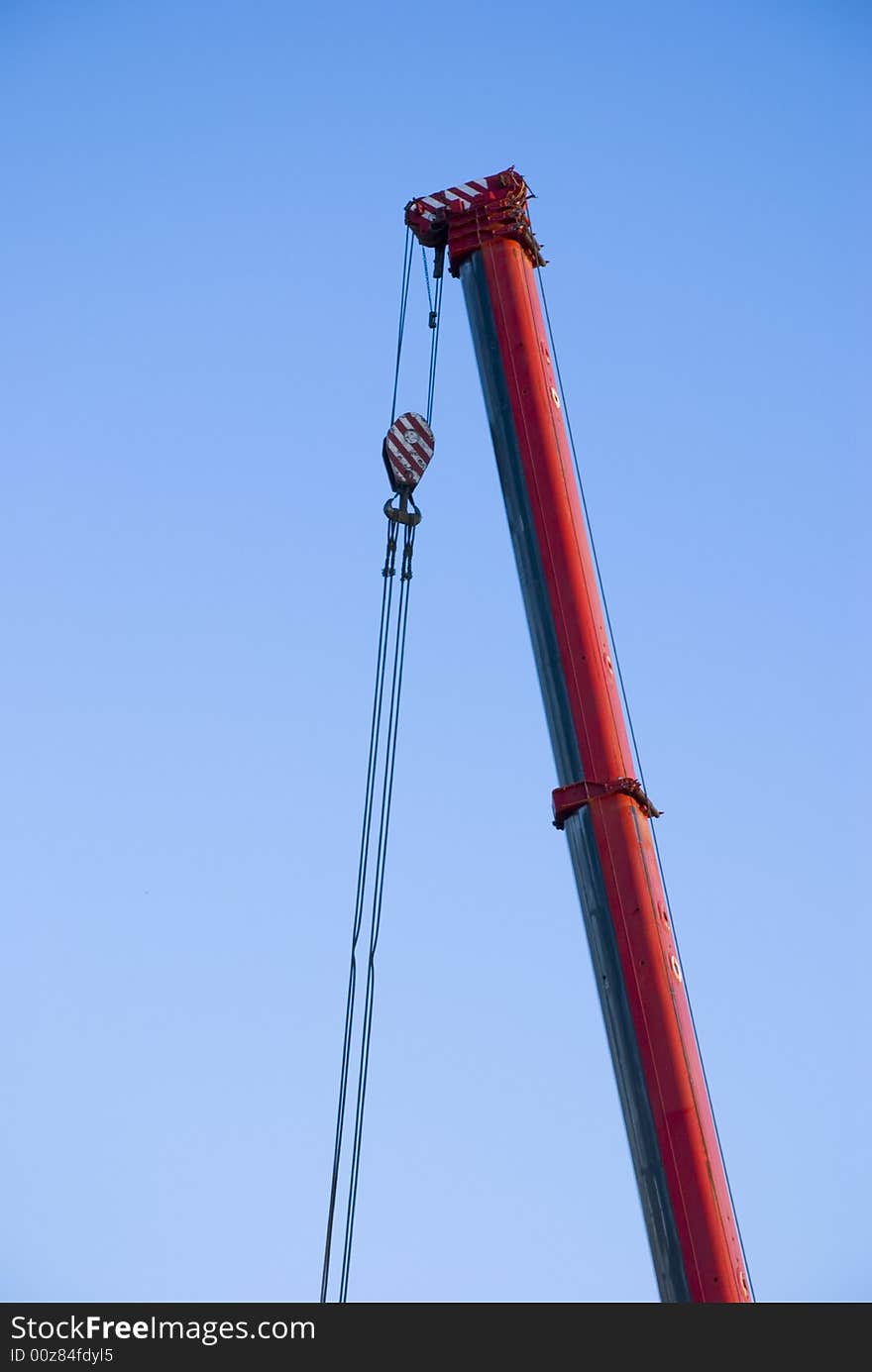 Crane in front of blue sky